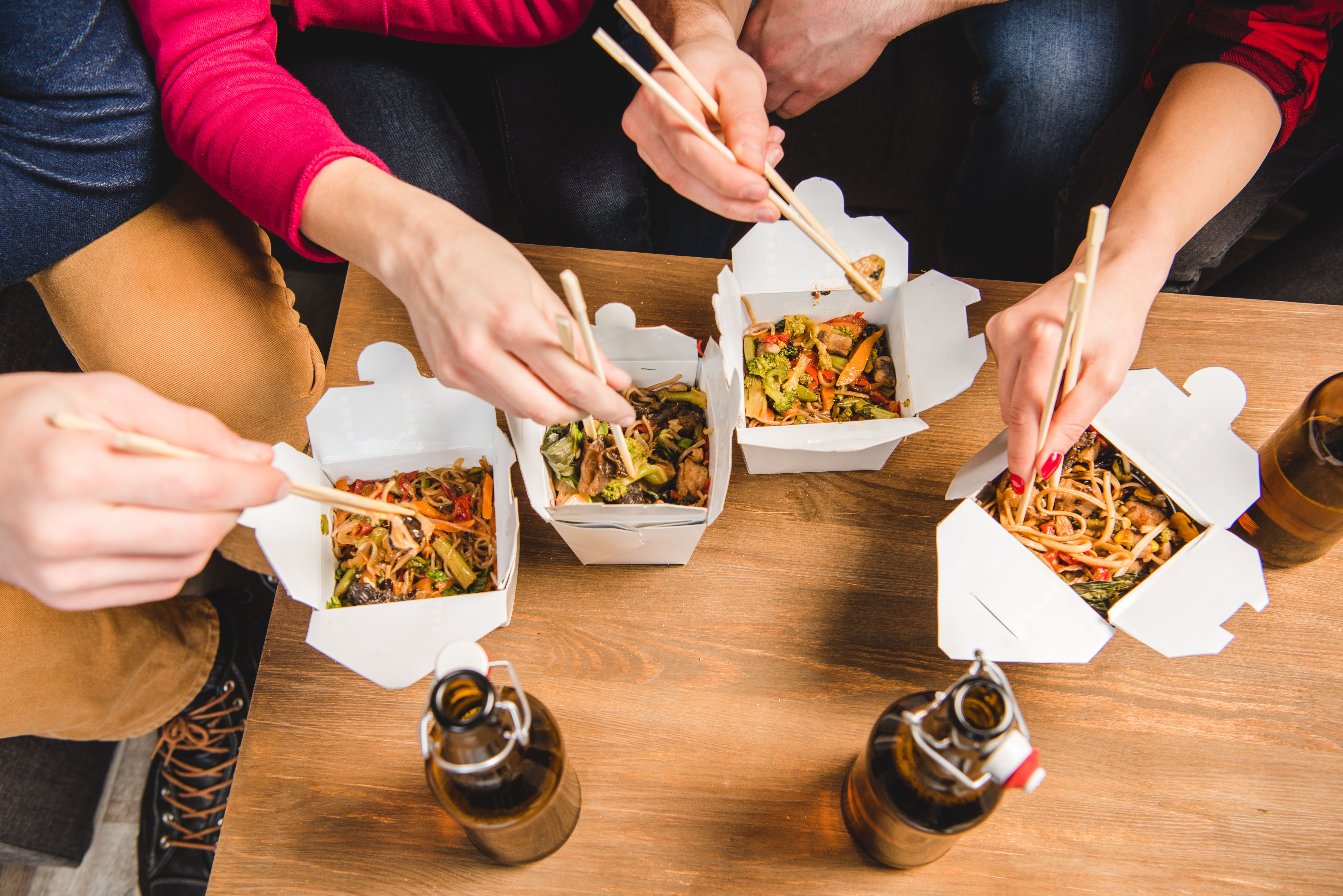 Students eating healthy noodles 